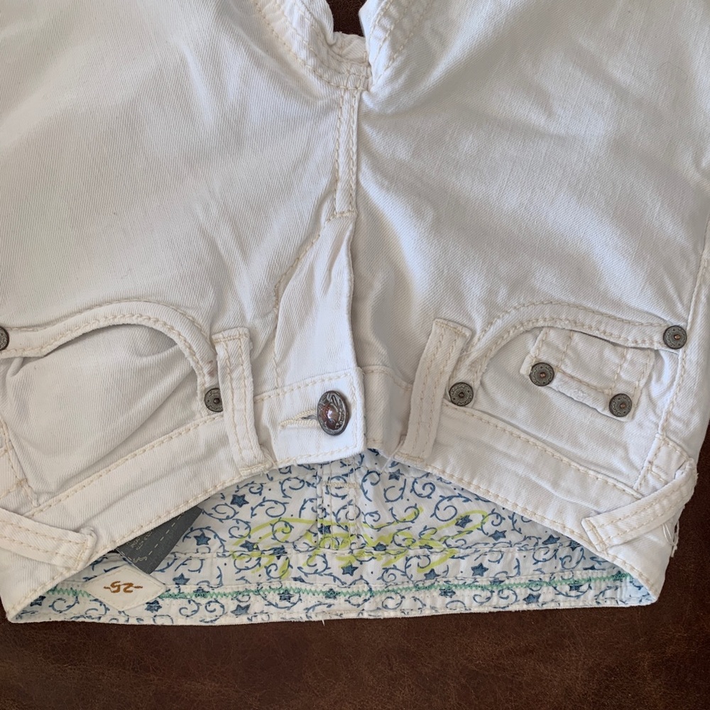 Stitches white denim